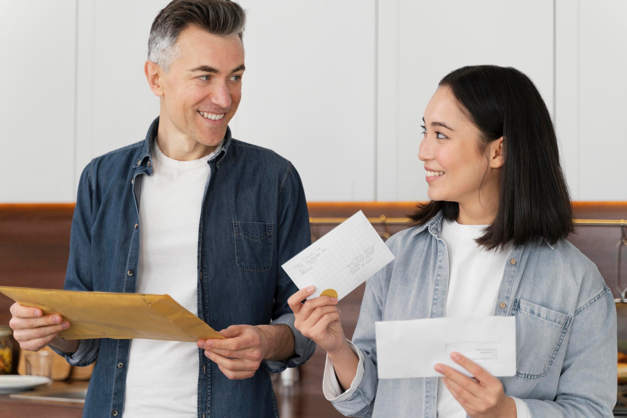 Short Sales and Credit Reports couple at home reading mail
