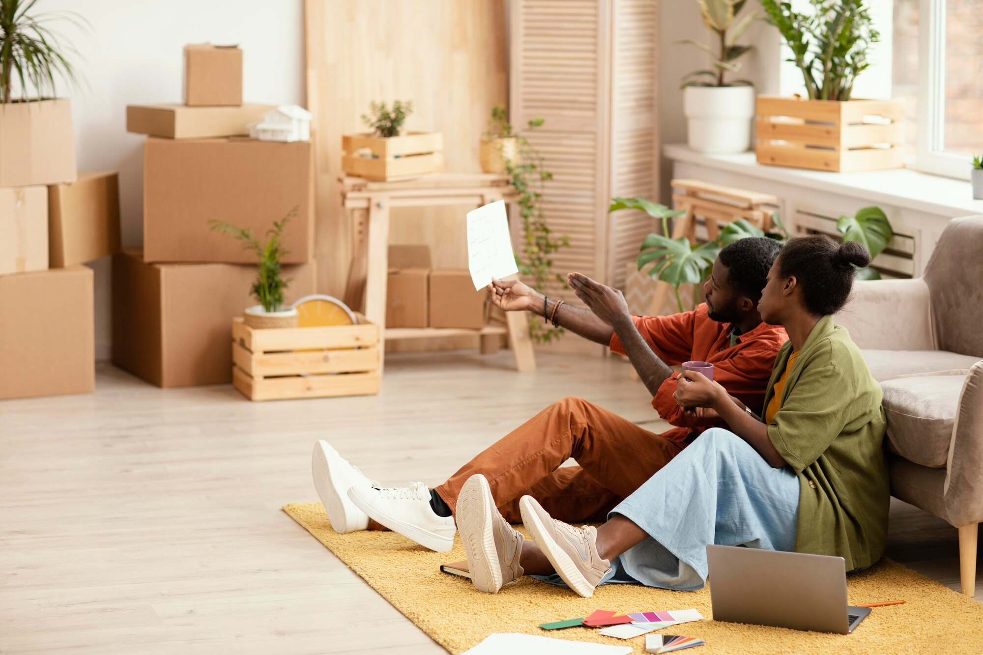Avoid Capital Gains Tax on Inherited Property couple making plans together for renovating home