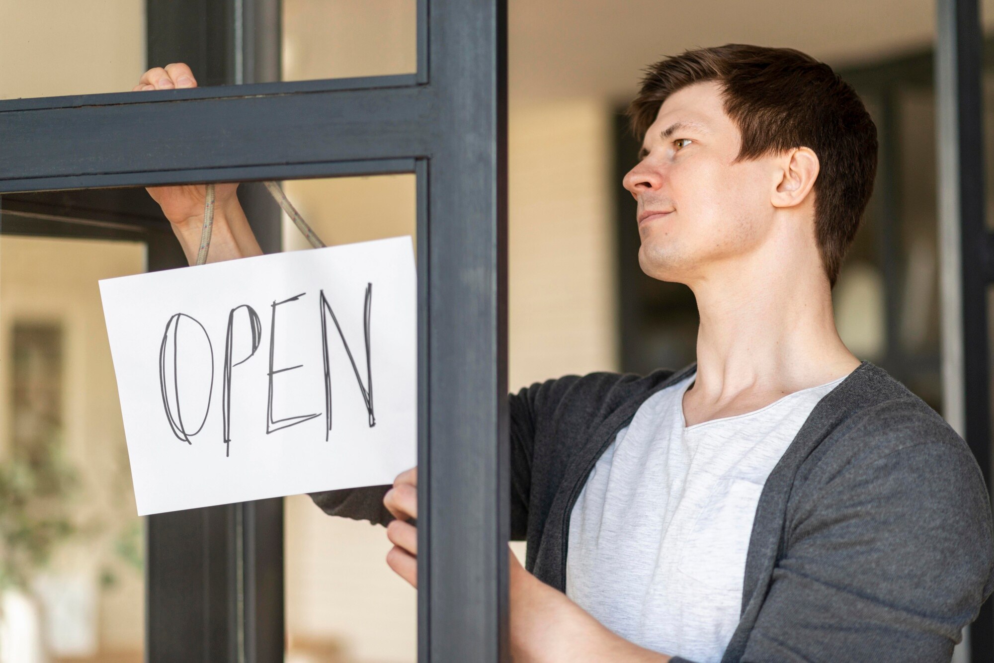 Selling Your Home With Opendoor: A Comprehensive Guide front view of man with open sign