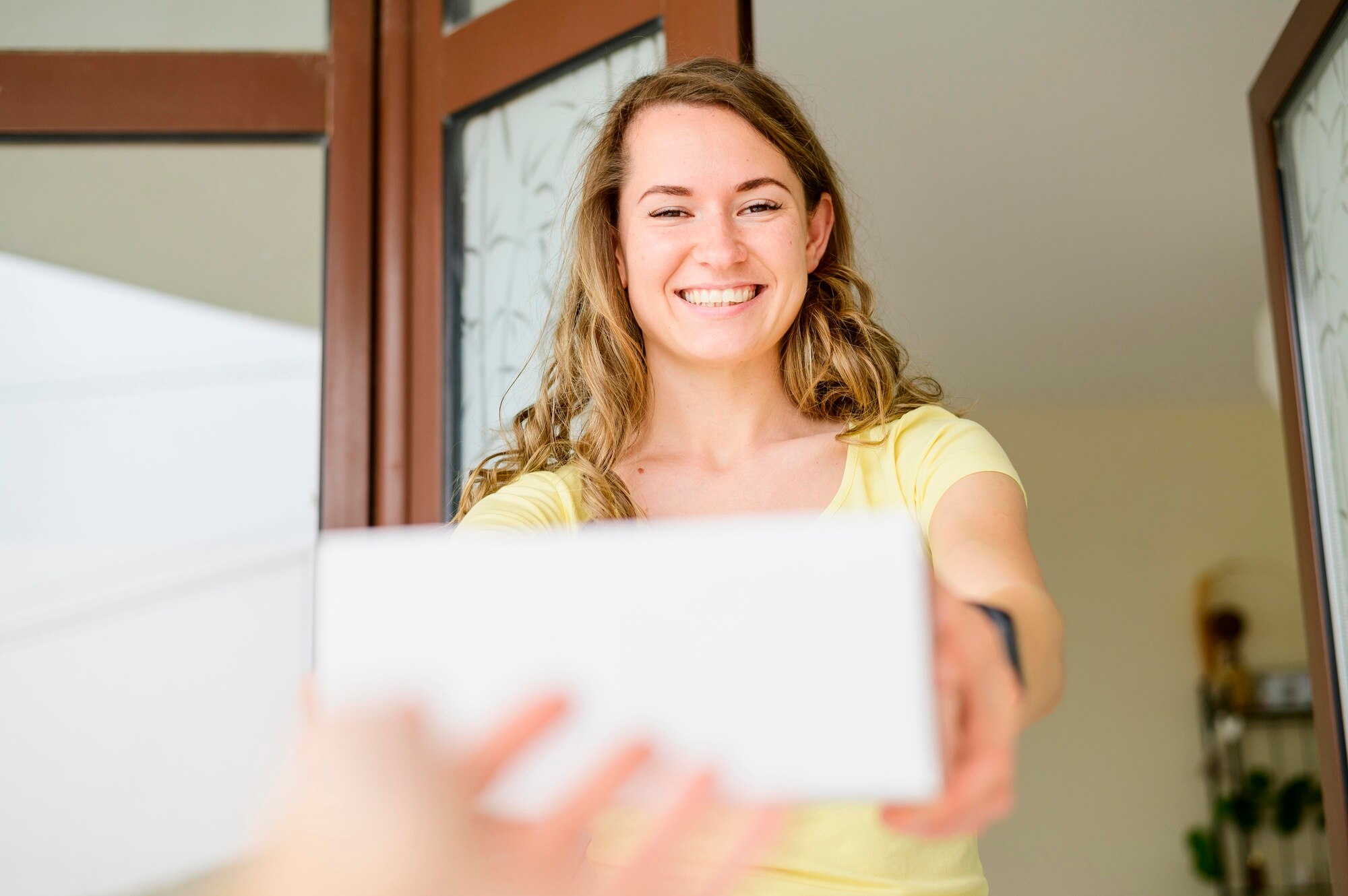 How to Sell Your House in 5 Days portrait of woman happy to received products ordered